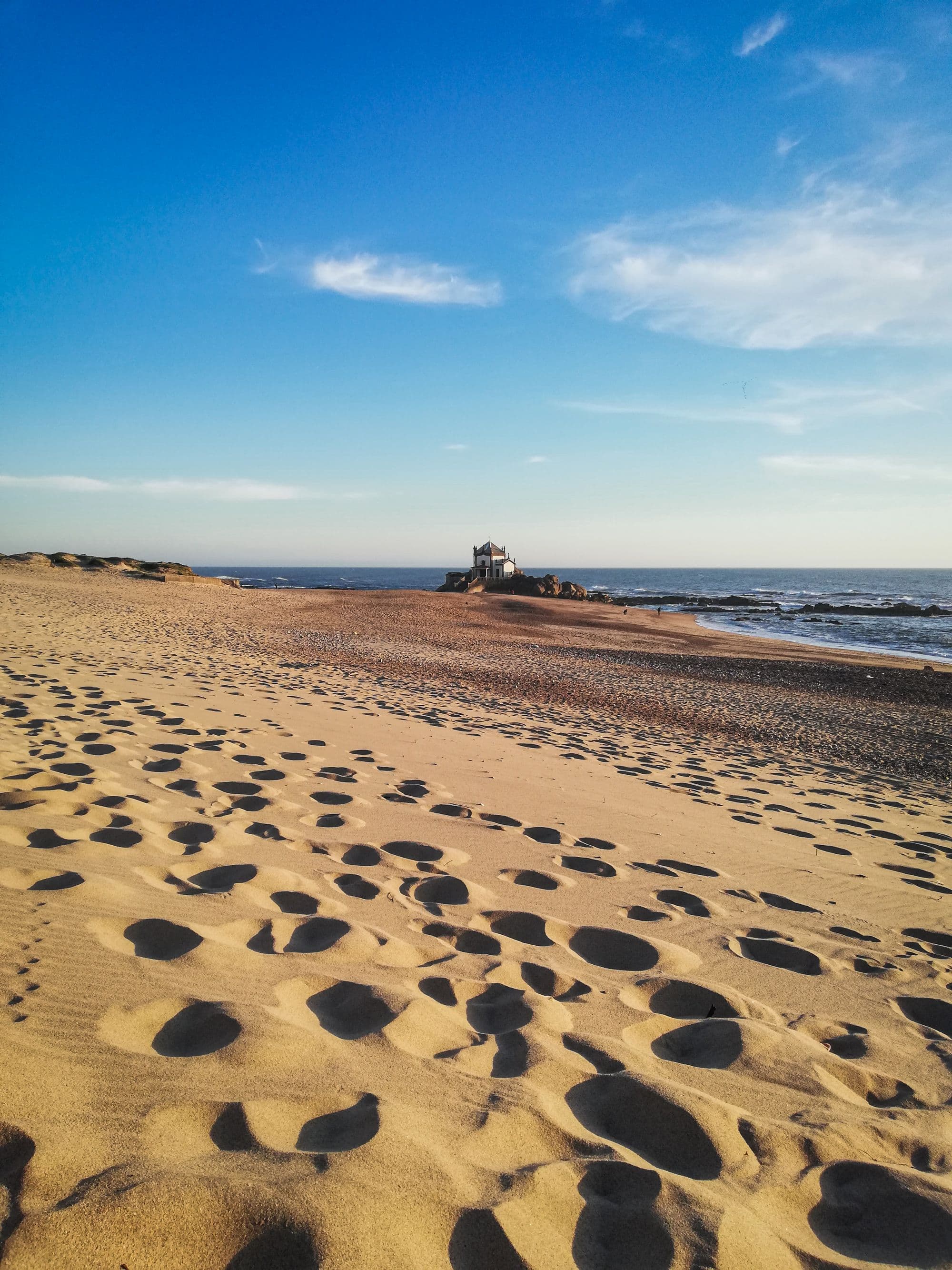 Capela do Senhor da Pedra on the rocks at Miramar Beach