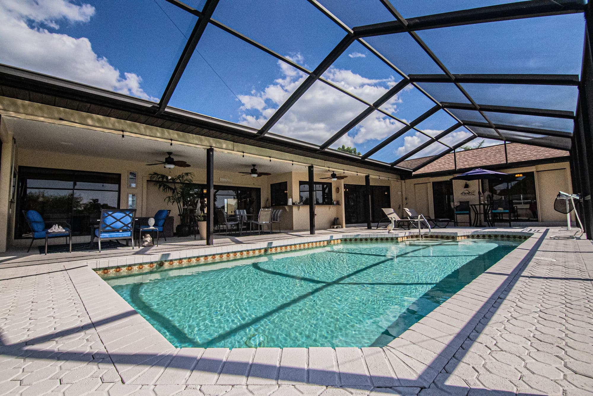 Outdoor swimming pool with covered terrace