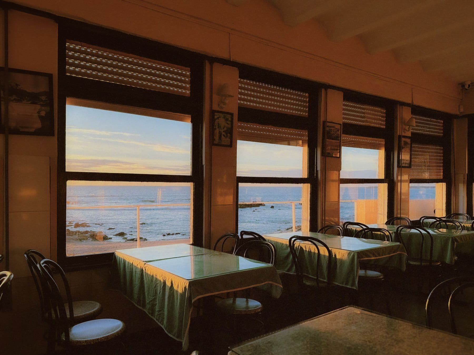 Restaurant dining room overlooking the Porto coastline