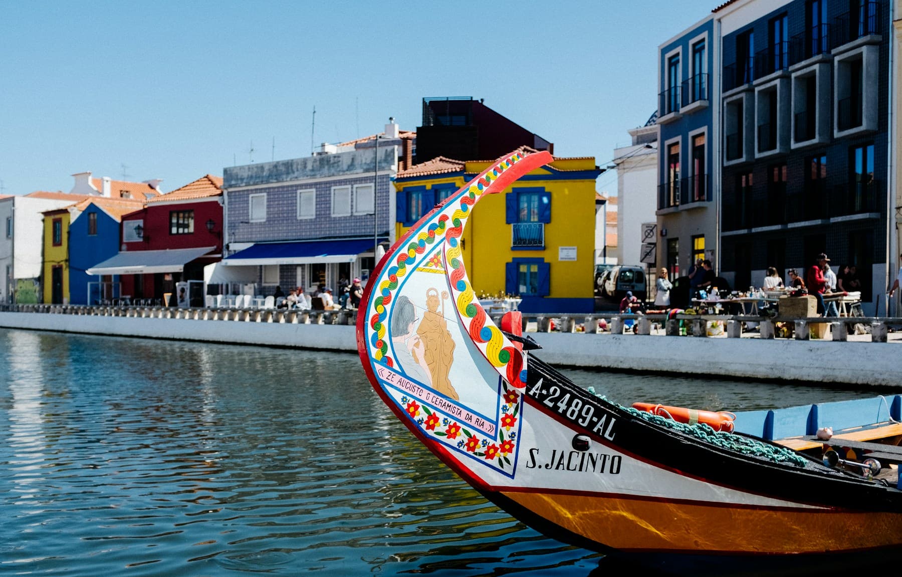 A brightly painted moliceiro boat on an Aveiro canal