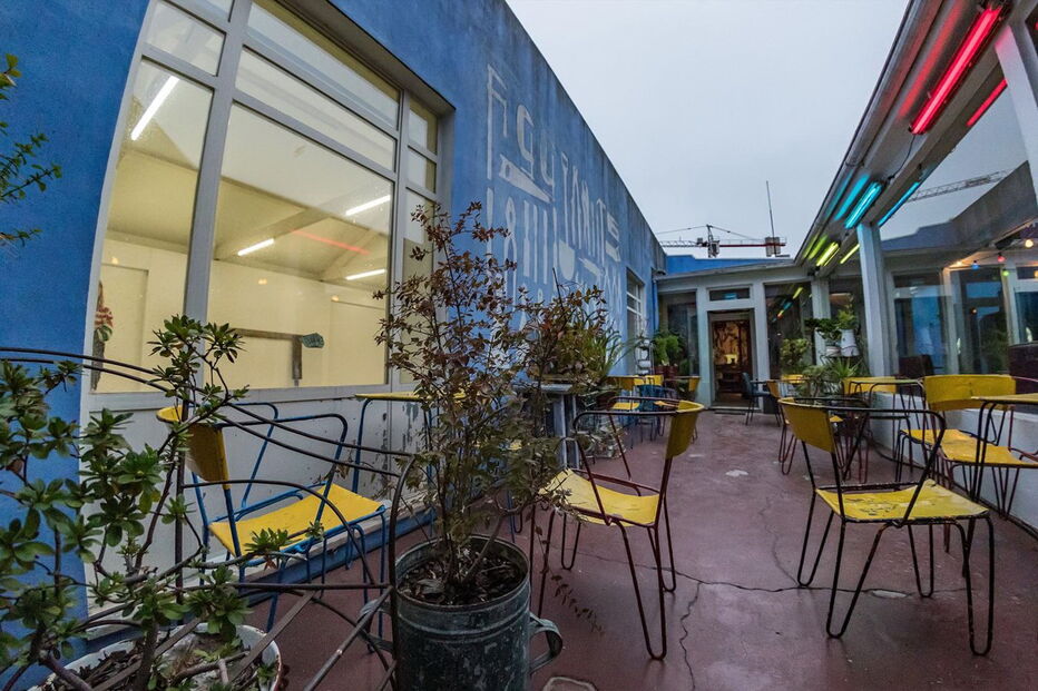 Colourful terrace at Maus Hábitos cultural venue in Porto
